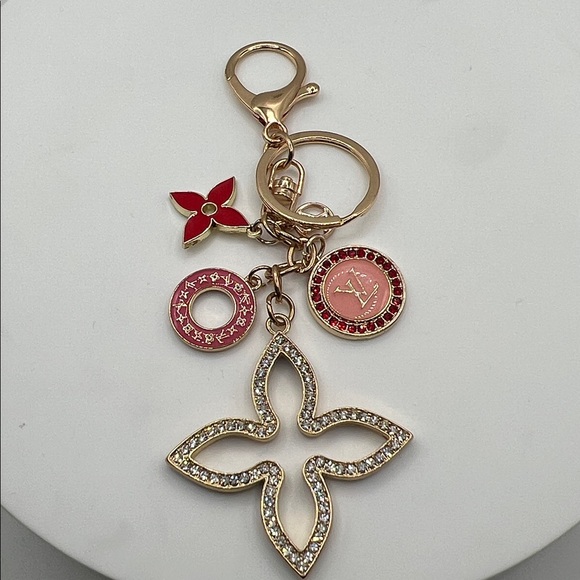 889. LV Elegant Gold and Red Keychain or Bag Charm - Picture 2 of 3